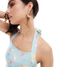 Top halter con laccio dietro ASOS DESIGN con stampa frutta