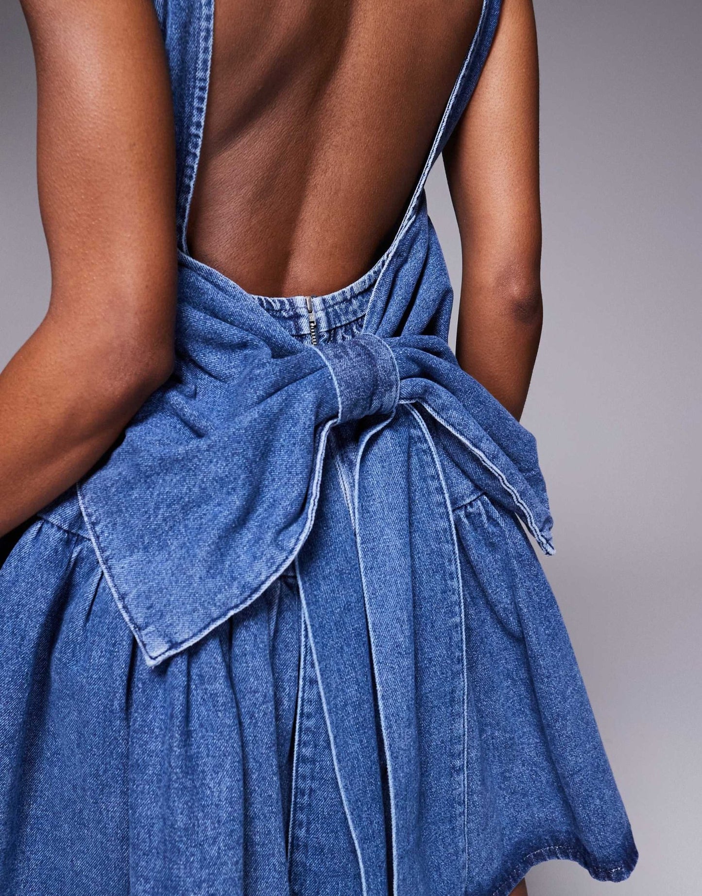 ASOS LUXE denim pleated bust skater dress with bow back in blue - ASOS Sample Sale EU Store