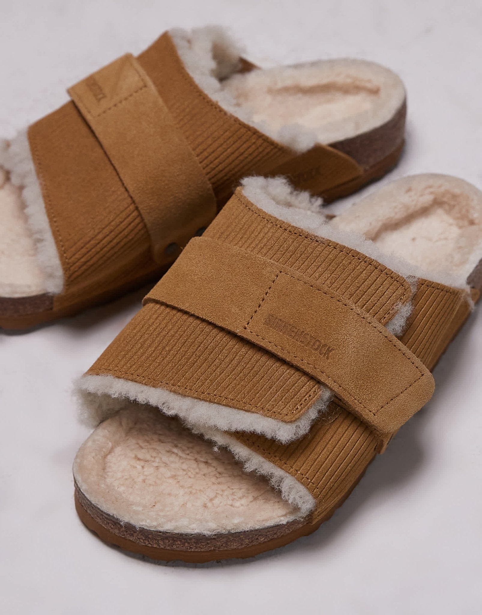 Birkenstock Unisex Kyoto shearling sandals in brown - ASOS Sample Sale EU Store