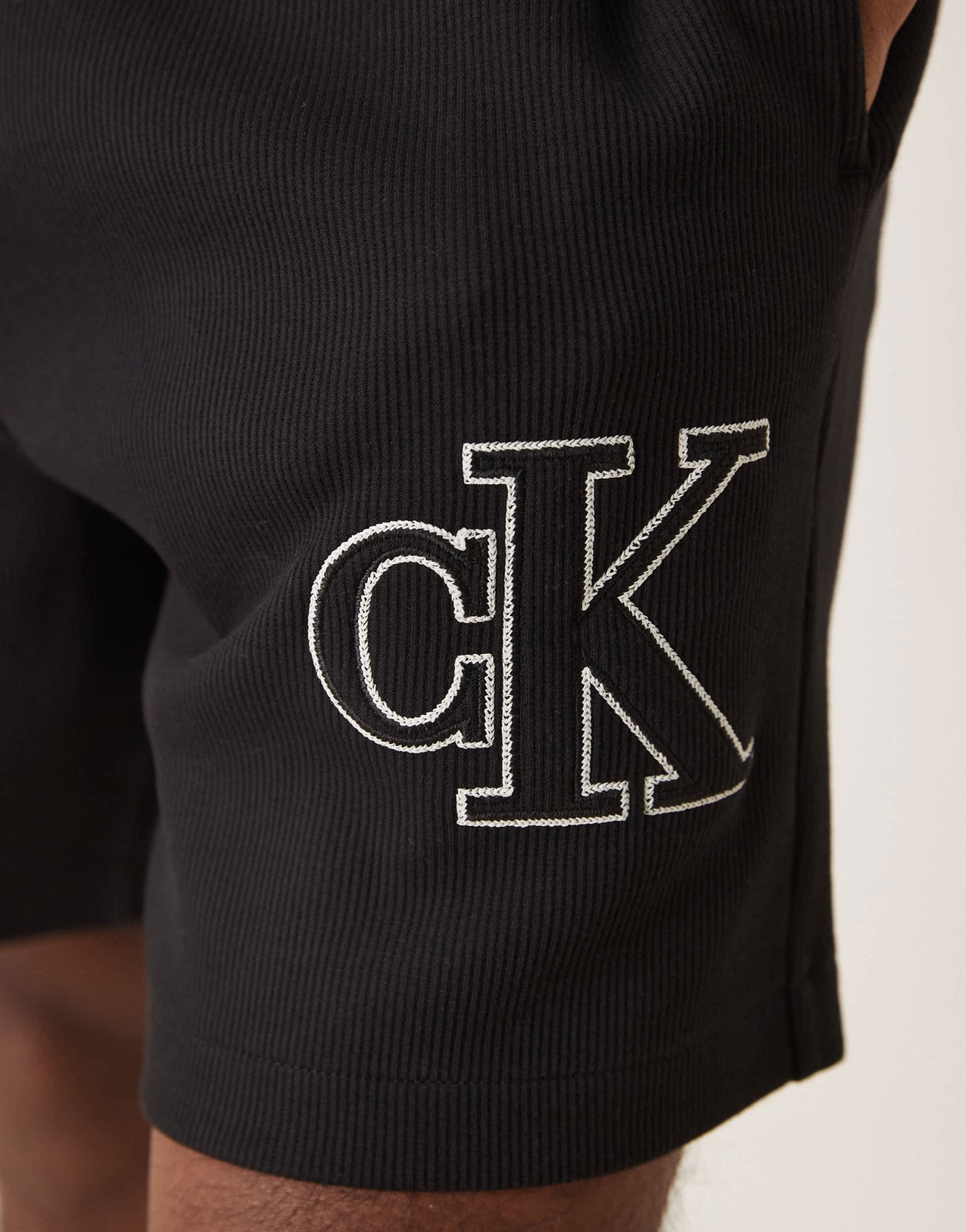 Calvin Klein Jeans applique logo knitted shorts in black - ASOS Sample Sale EU Store