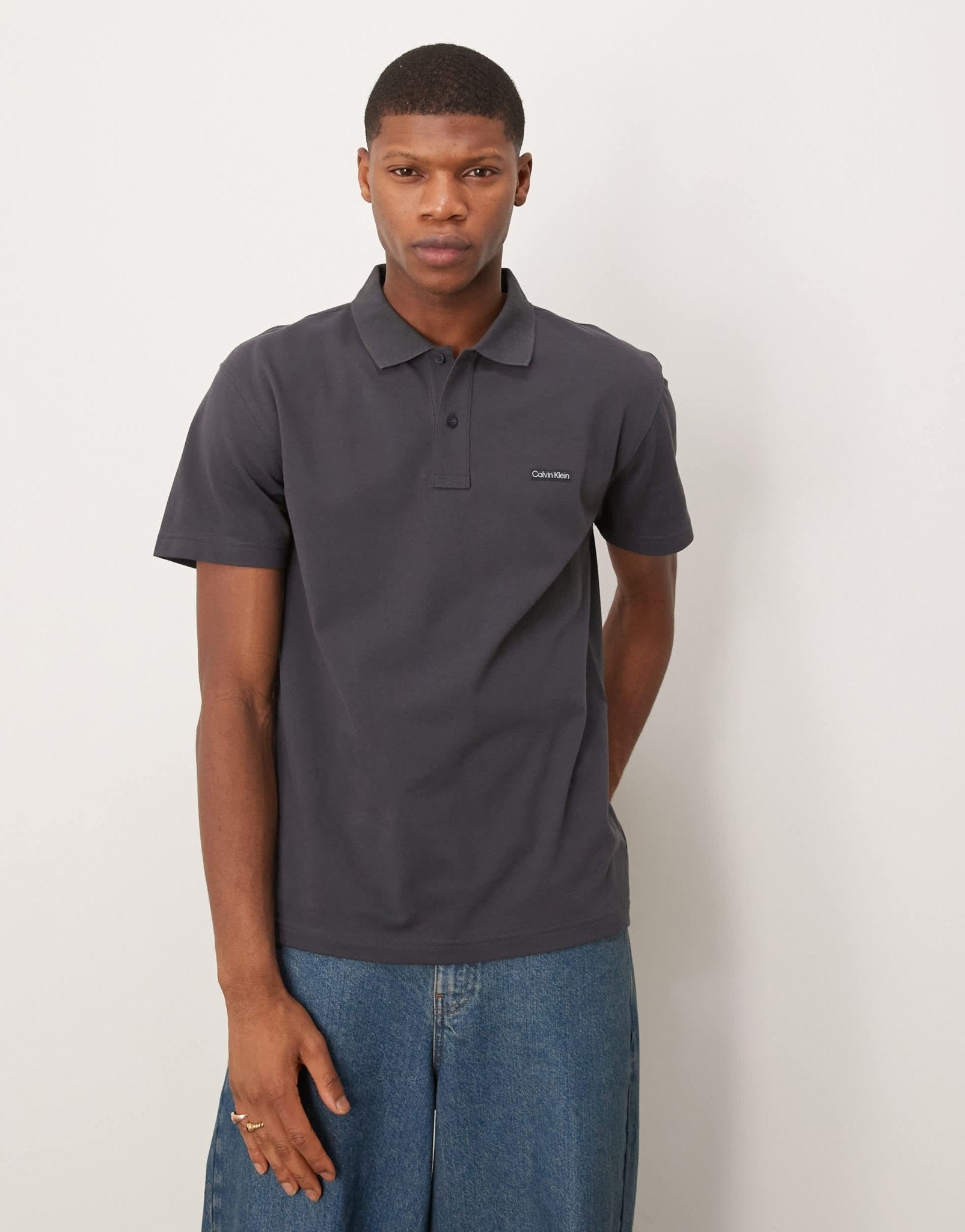 Calvin Klein Jeans label logo polo in black - ASOS Sample Sale EU Store