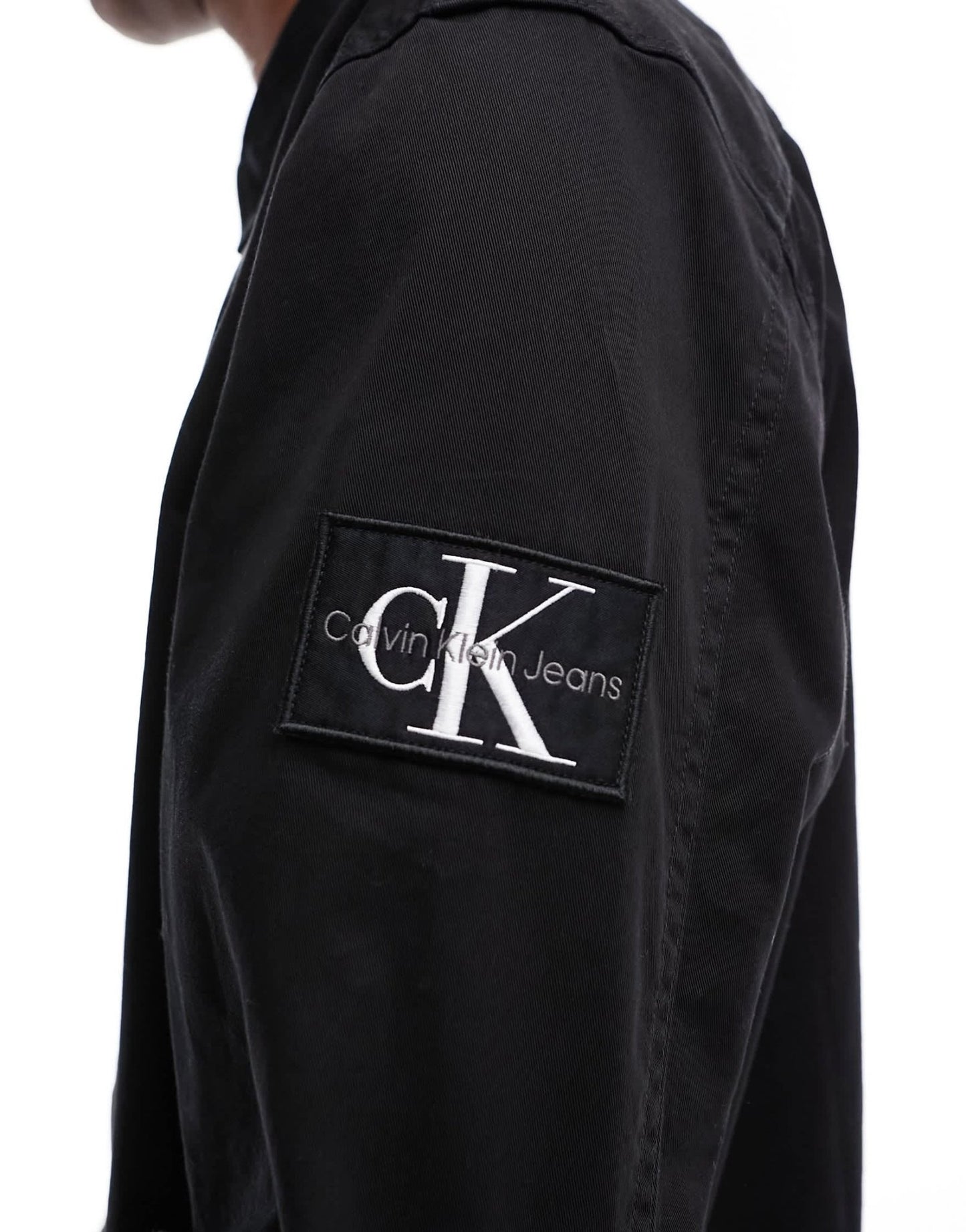 Calvin Klein Jeans monogram logo badge relaxed shirt in black - ASOS Sample Sale EU Store