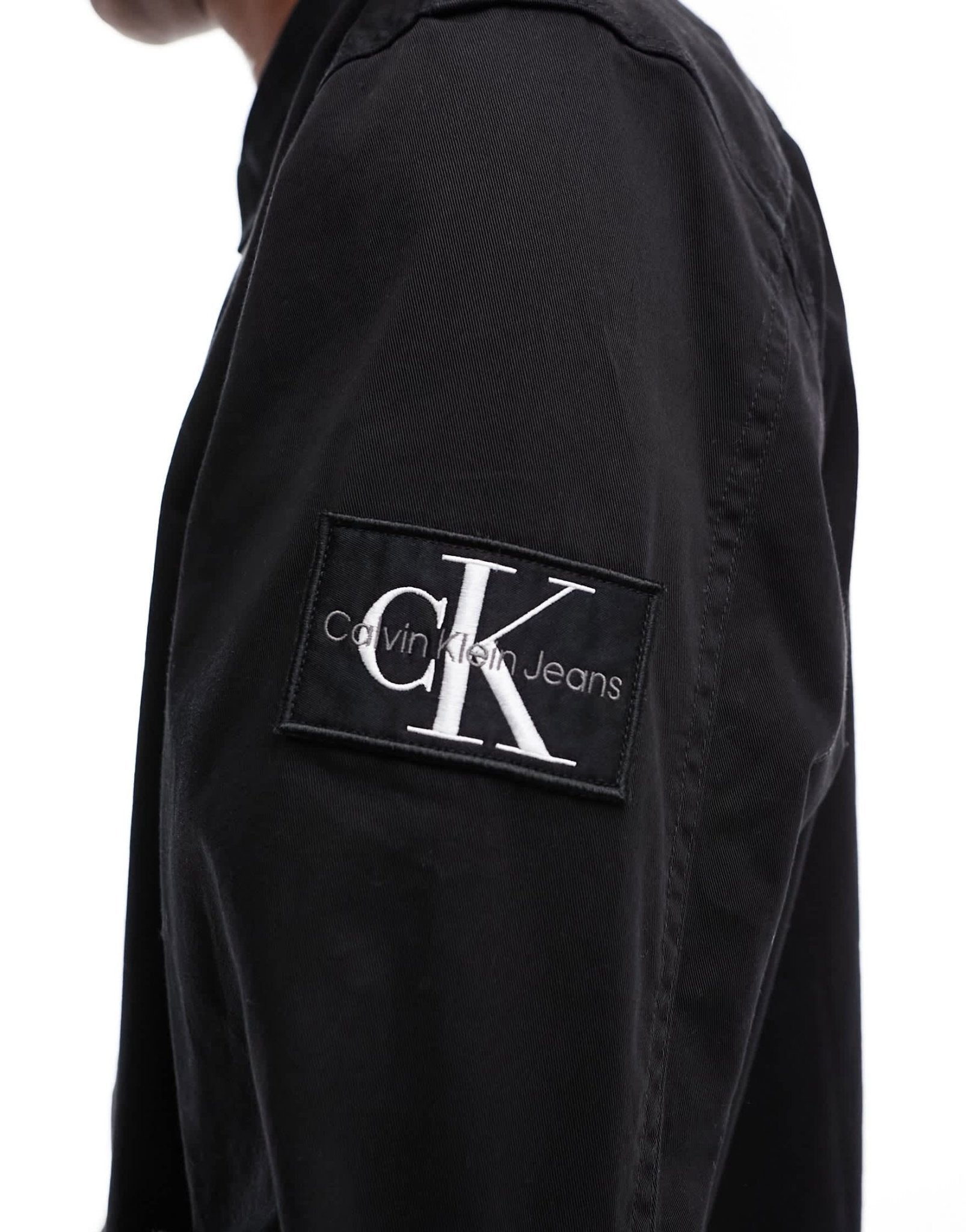 Calvin Klein Jeans monogram logo badge relaxed shirt in black - ASOS Sample Sale EU Store