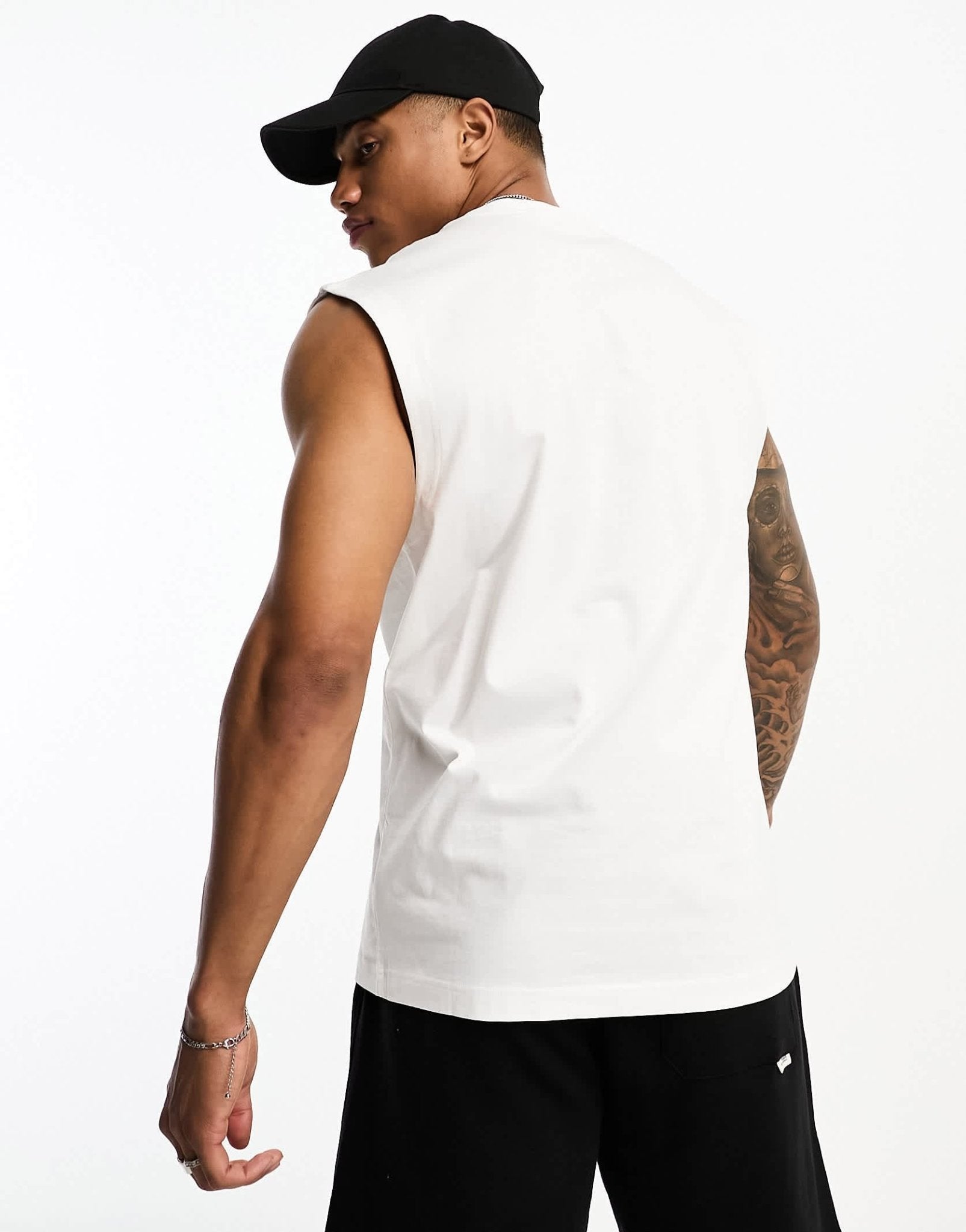 Calvin Klein Jeans monogram logo sleeveless vest in white - ASOS Sample Sale EU Store