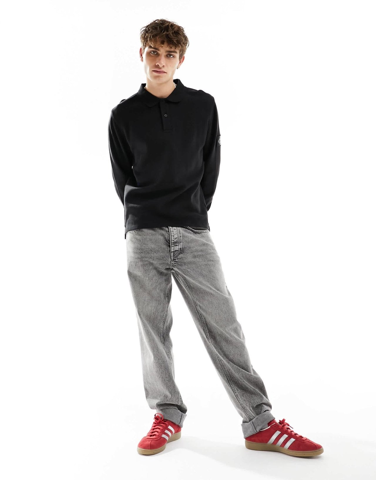 Calvin Klein Jeans waffle long sleeve badge logo polo shirt in black - ASOS Sample Sale EU Store