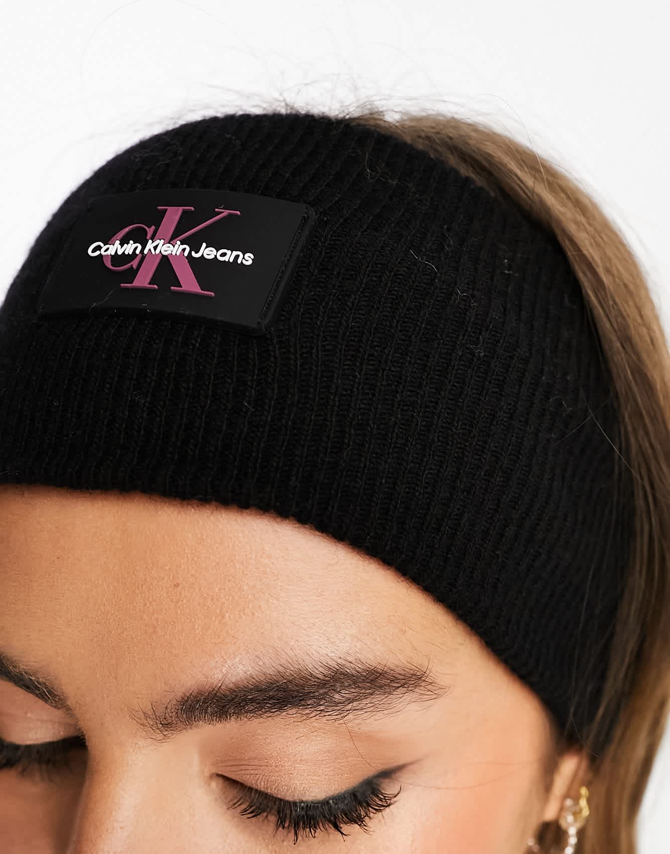 Calvin Klein monogram logo rubberized knit headband in black - ASOS Sample Sale EU Store
