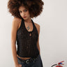 Top halter delicato in pizzo COLLUSION in nero