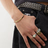 Pulsera curva Faded Future con identificación en dorado