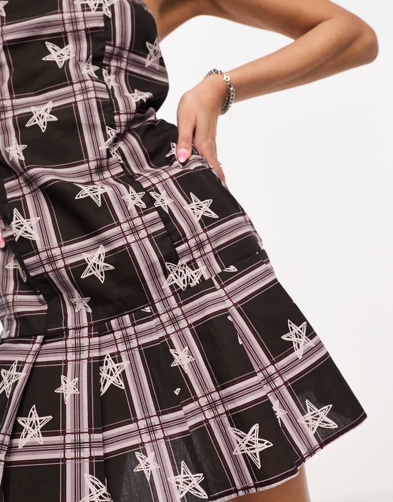 Heartbreak bandeau mini dress with pleated peplum hem in brown star print - ASOS Sample Sale EU Store