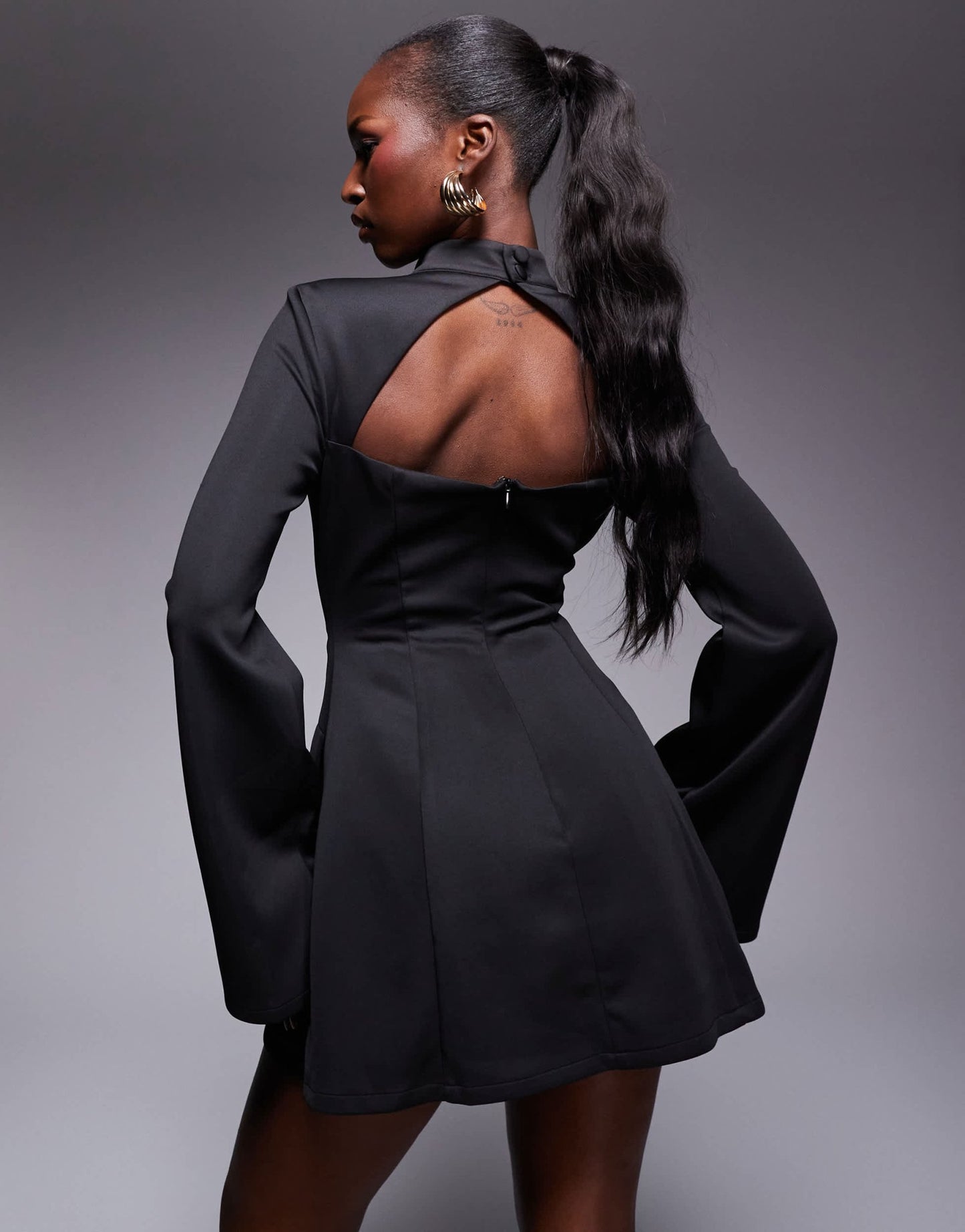 Heiress Beverly Hills exclusive sculpted high neck cut out flared sleeve mini dress in black - ASOS Sample Sale EU Store