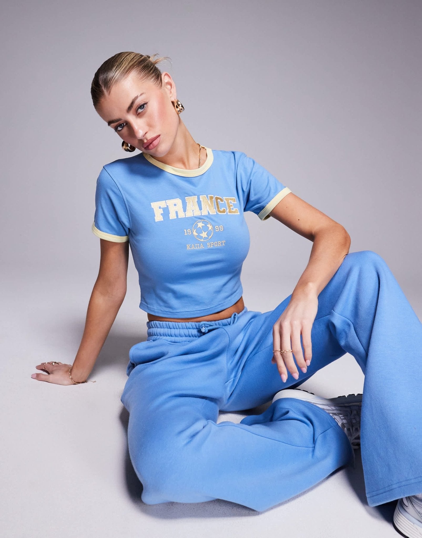 Kaiia cotton rich sport contrast trim France baby tee co - ord in blue and yellow - ASOS Sample Sale EU Store