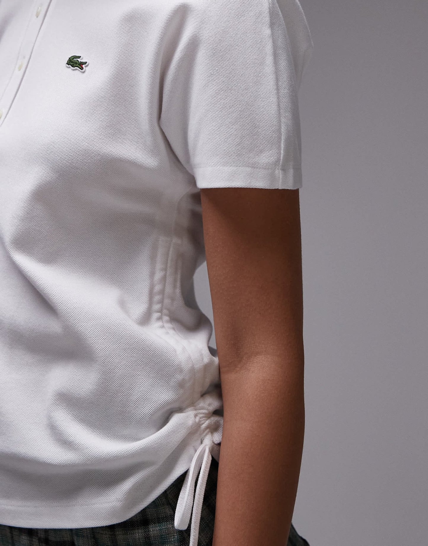 Lacoste polo shirt in white with ruched sideseam detail - ASOS Sample Sale EU Store