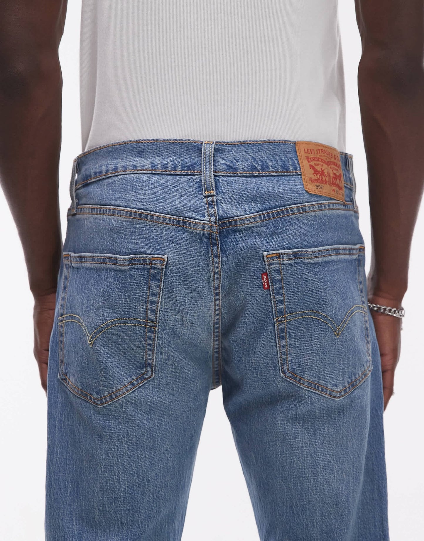 Levi's 502 tapered fit performance cool denim jeans in mid blue - ASOS Sample Sale EU Store