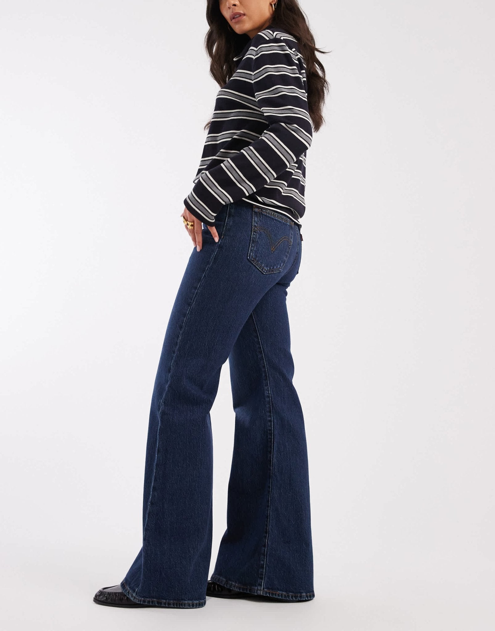 Levi's ribcage bells high rise flare jeans in mid blue - ASOS Sample Sale EU Store