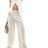 Pantalones rectos de lino Mango en beige