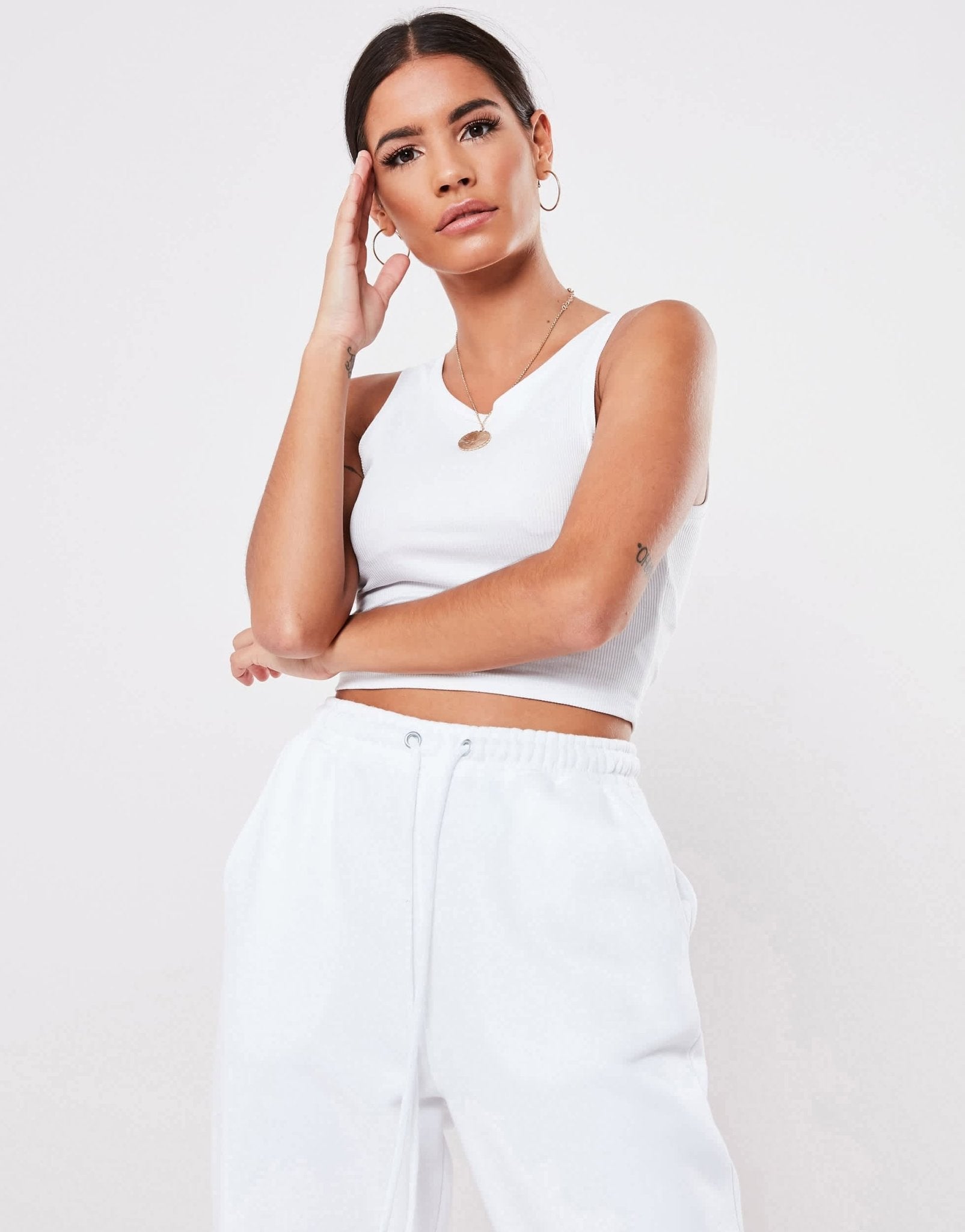 Missguided basics ribbed sleeveless crop top in white - ASOS Sample Sale EU Store