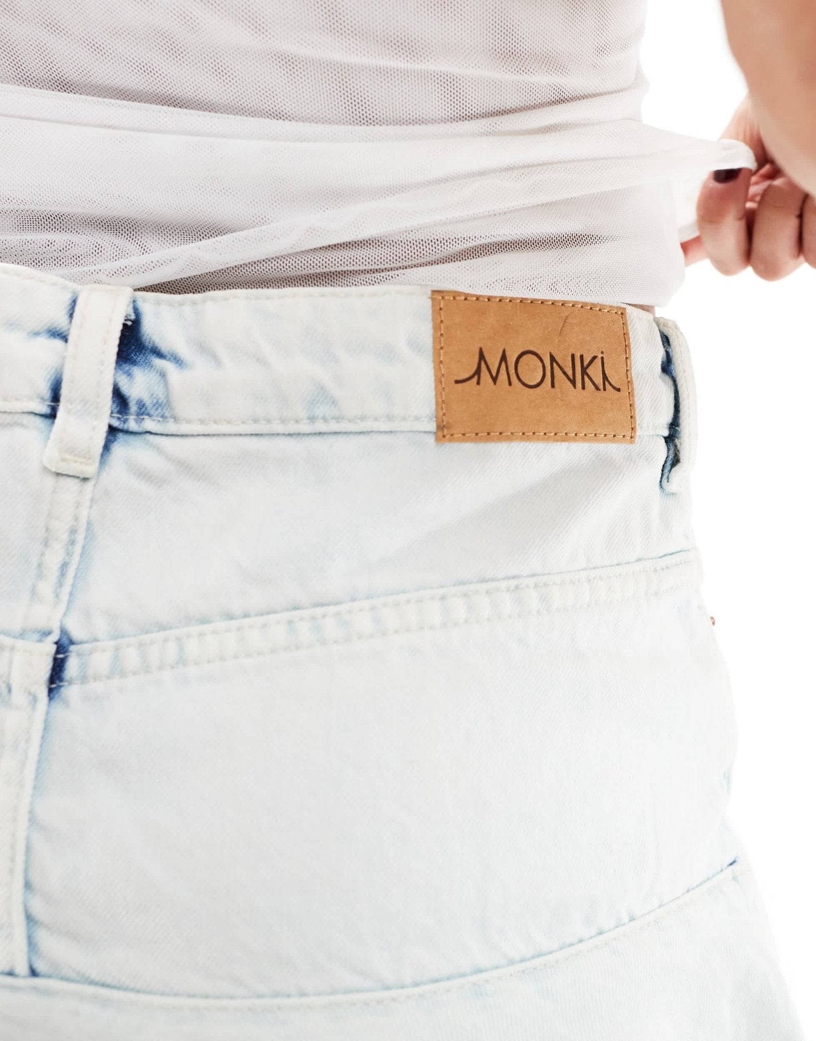 Monki mini denim asymmetric ruffle skirt in light blue - ASOS Sample Sale EU Store