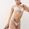 Monki mix and match tie side bikini bottom in white and black polka dot