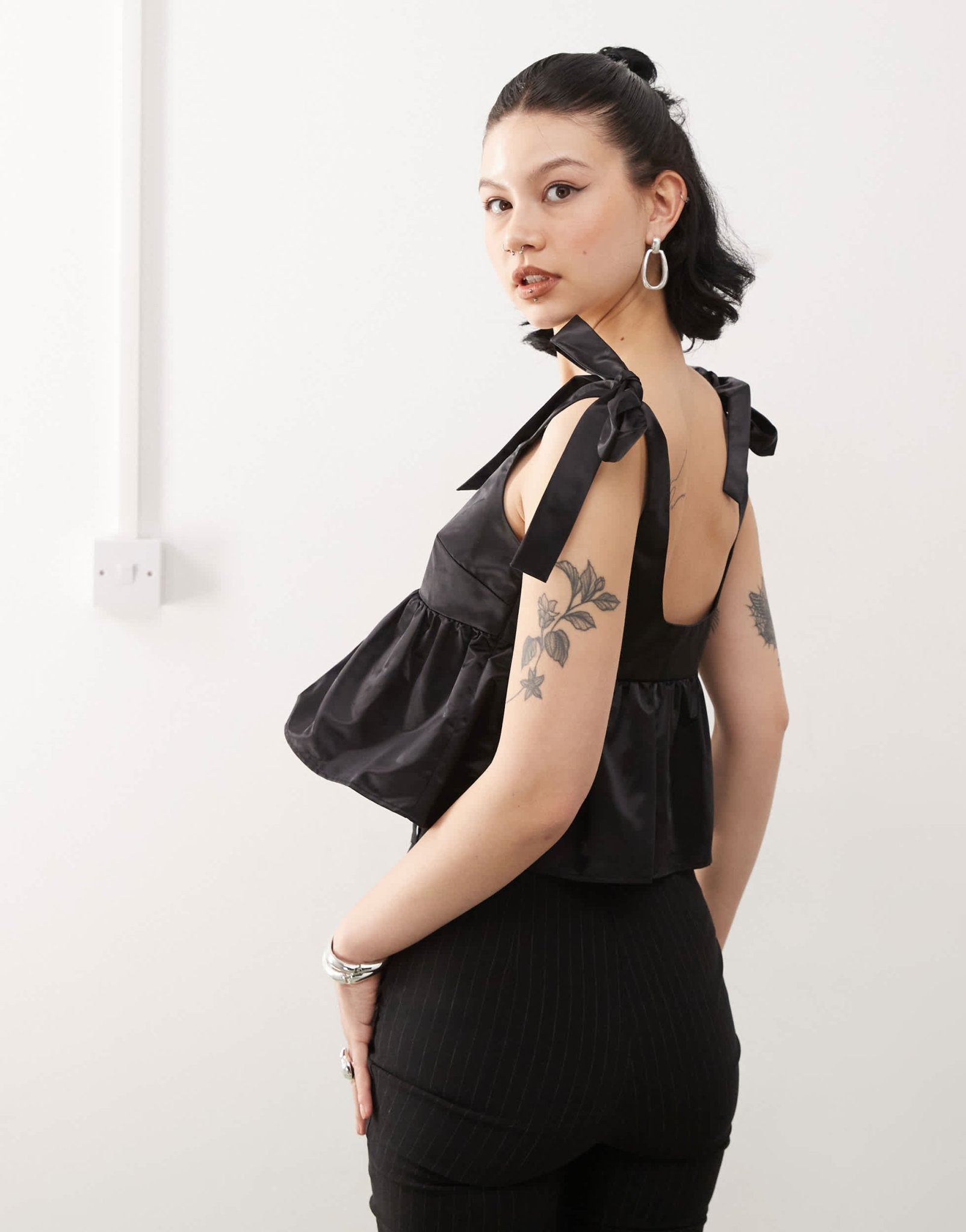 Monki satin peplum vest with bow strap detail in black - ASOS Sample Sale EU Store