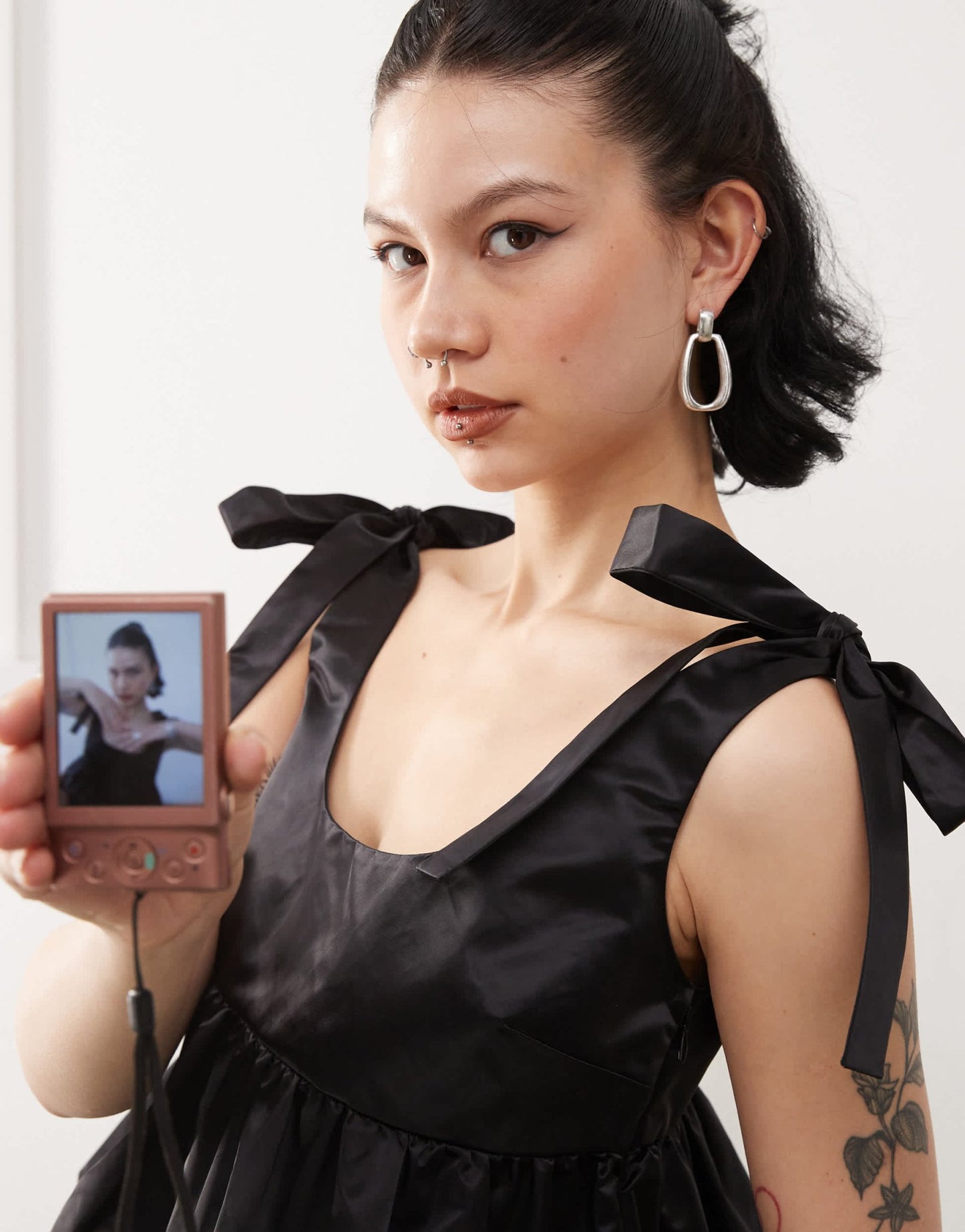 Monki satin peplum vest with bow strap detail in black - ASOS Sample Sale EU Store