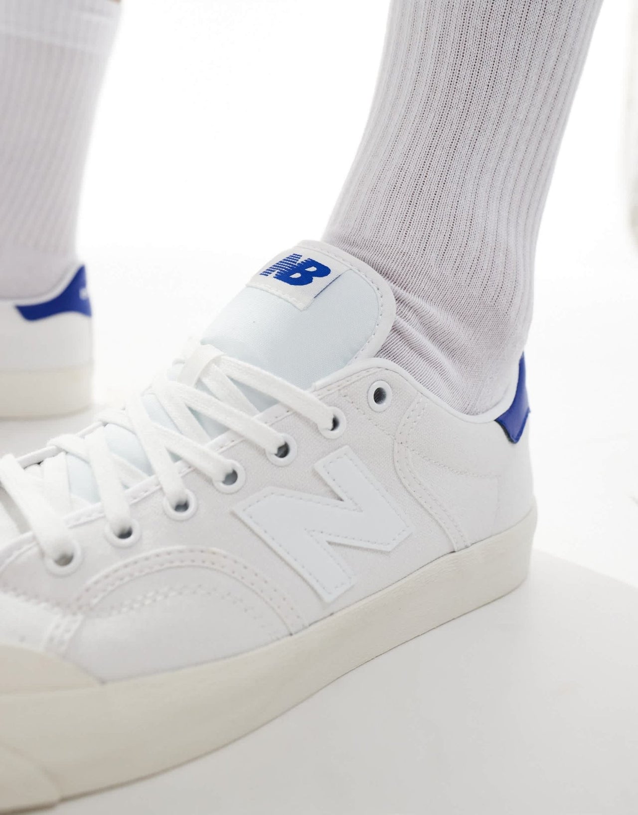 New Balance 100 trainers in white and blue - ASOS Sample Sale EU Store