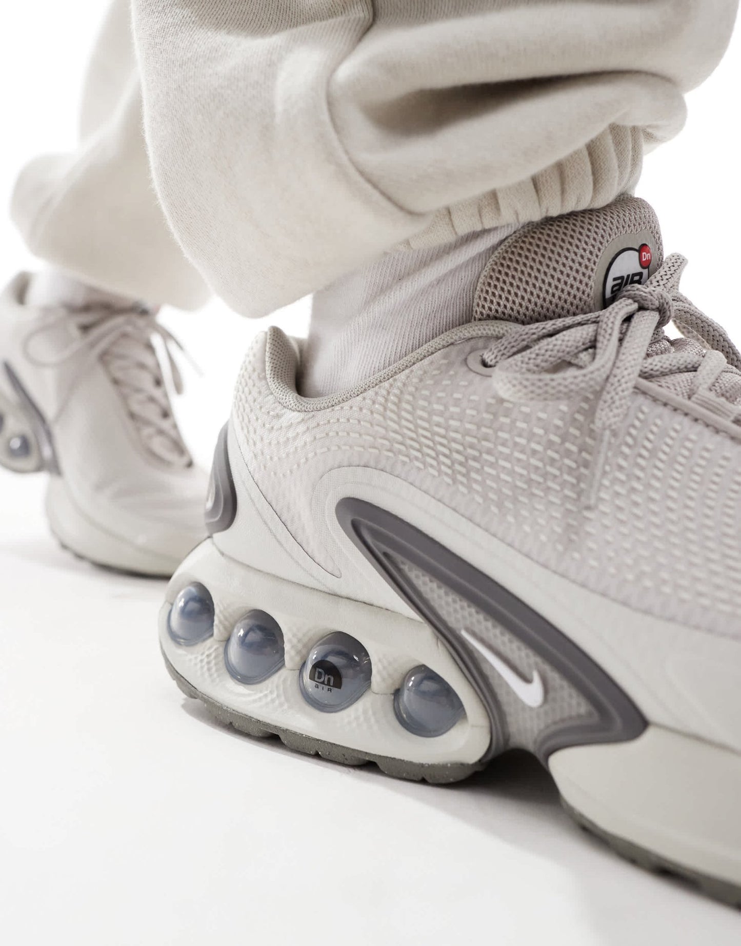 Nike Air Max DN trainers in light grey - ASOS Sample Sale EU Store