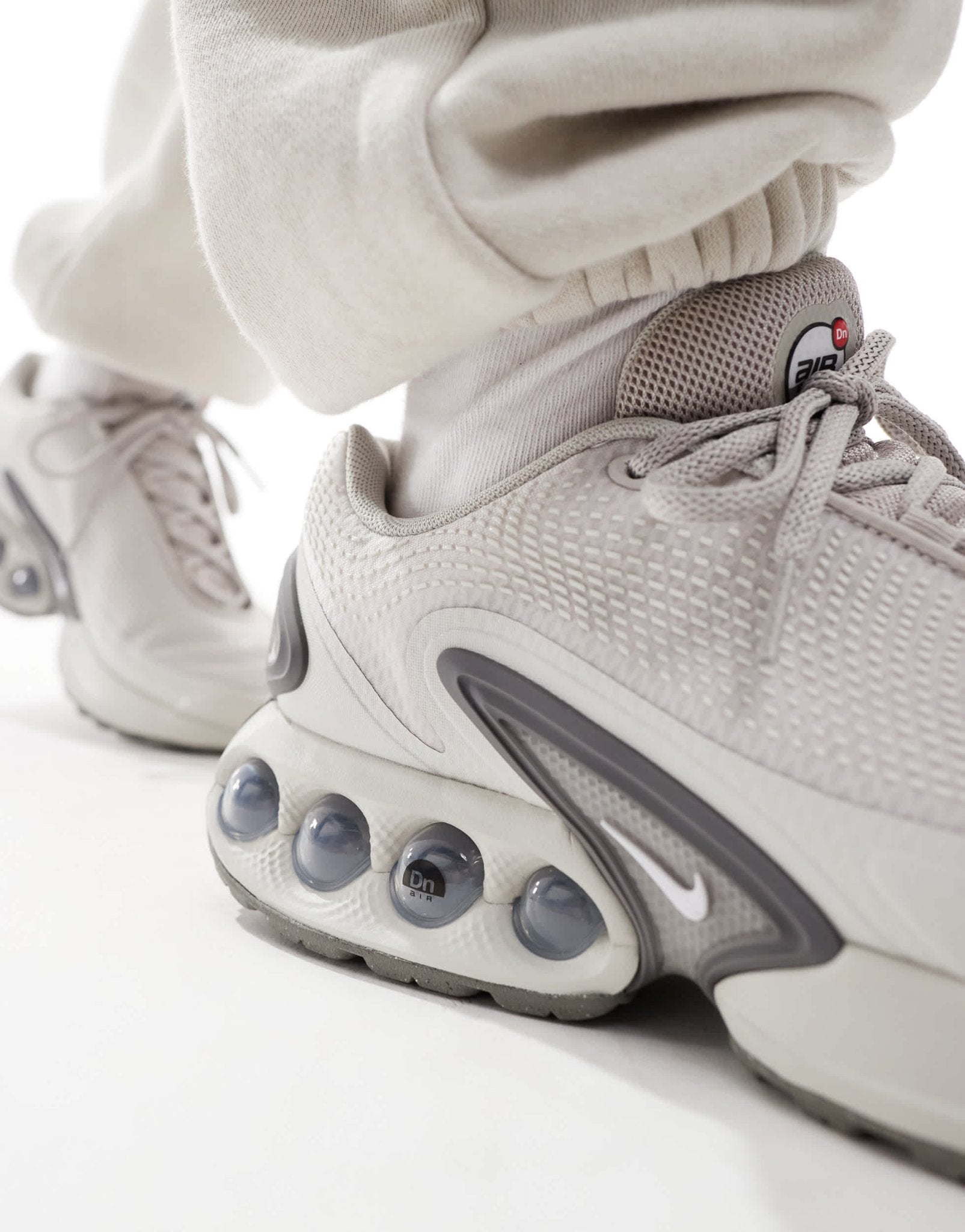 Nike Air Max DN trainers in light grey - ASOS Sample Sale EU Store