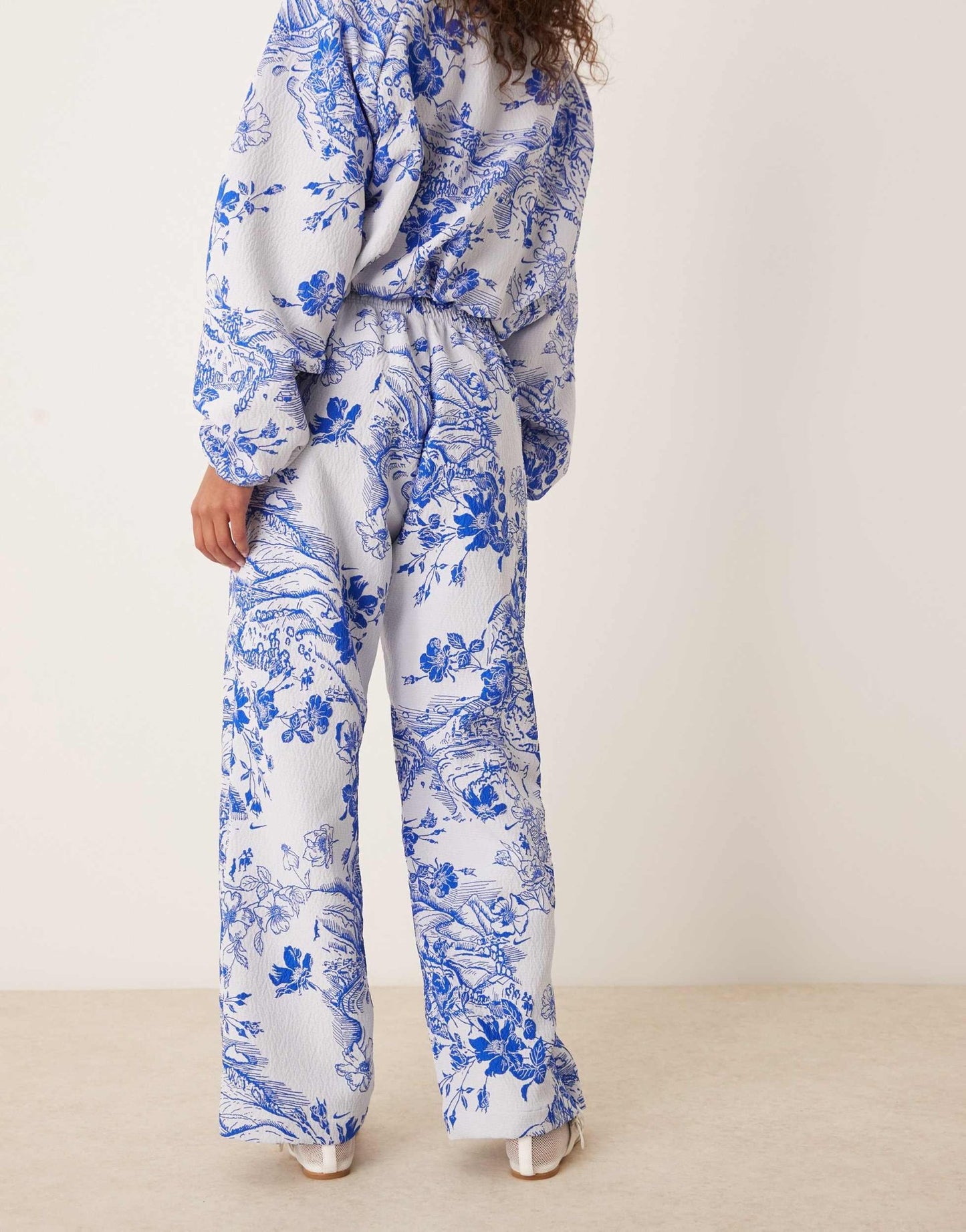 Nike MDC jaquard floral wide leg trousers in blue and white - ASOS Sample Sale EU Store