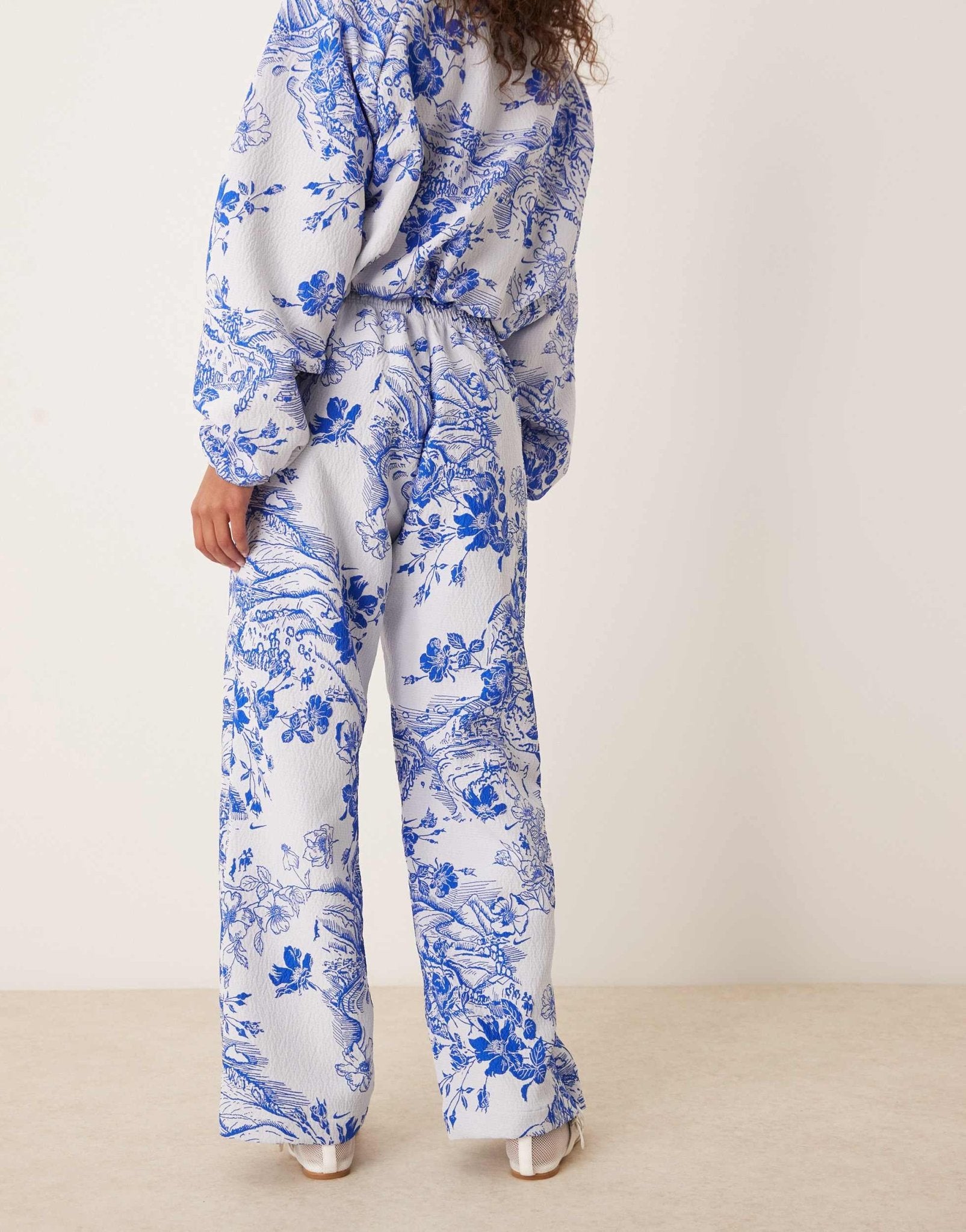 Nike MDC jaquard floral wide leg trousers in blue and white - ASOS Sample Sale EU Store
