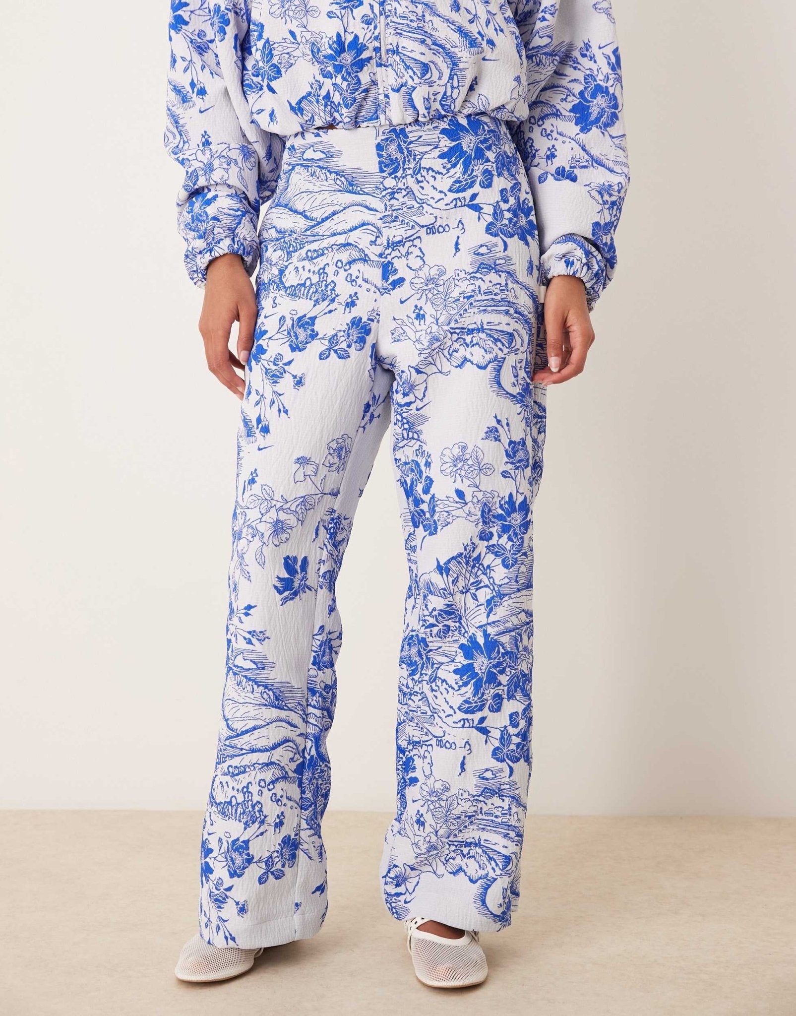 Nike MDC jaquard floral wide leg trousers in blue and white - ASOS Sample Sale EU Store