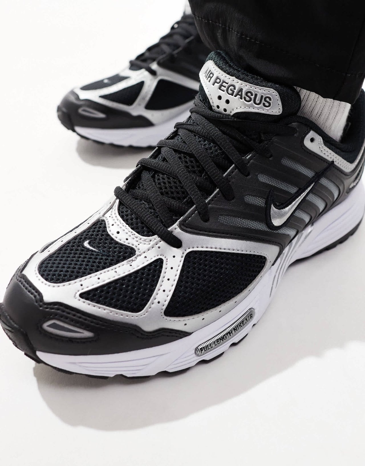 Nike Pegasus 2005 trainers in black and metallic silver - ASOS Sample Sale EU Store