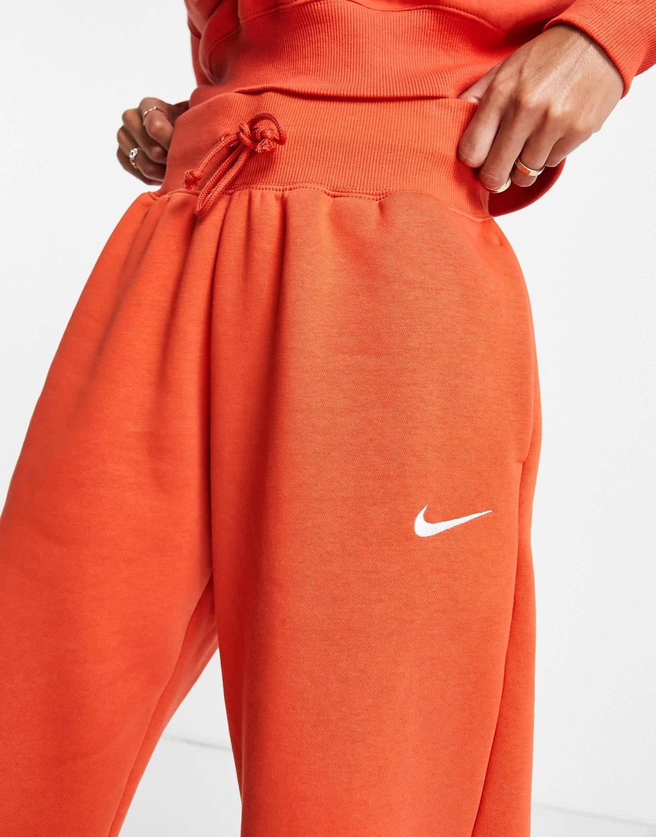 Nike Phoenix Fleece joggers in orange - ORANGE - ORANGE - ASOS Sample Sale EU Store