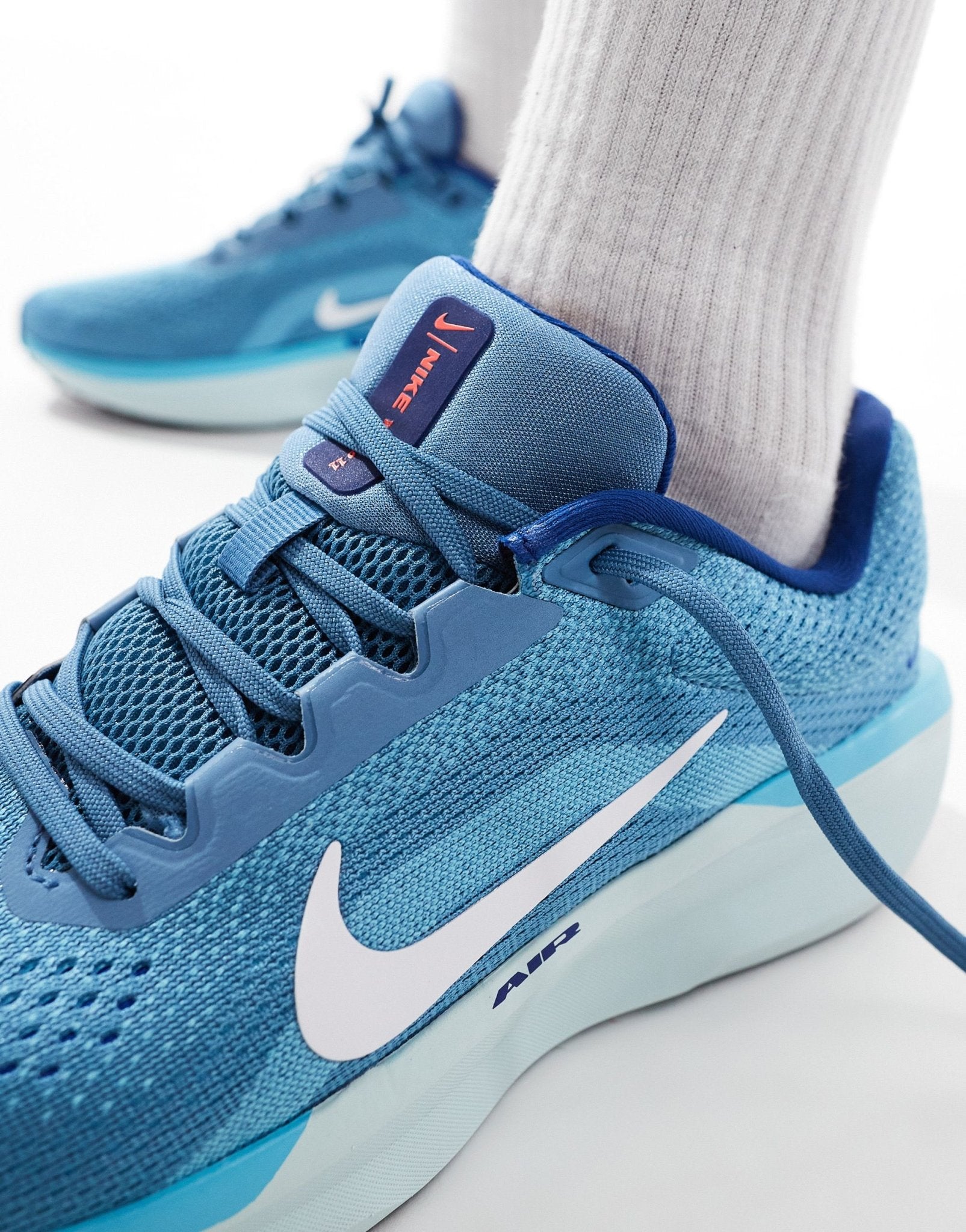 Nike Running Air Winflo 11 trainers in blue - ASOS Sample Sale EU Store