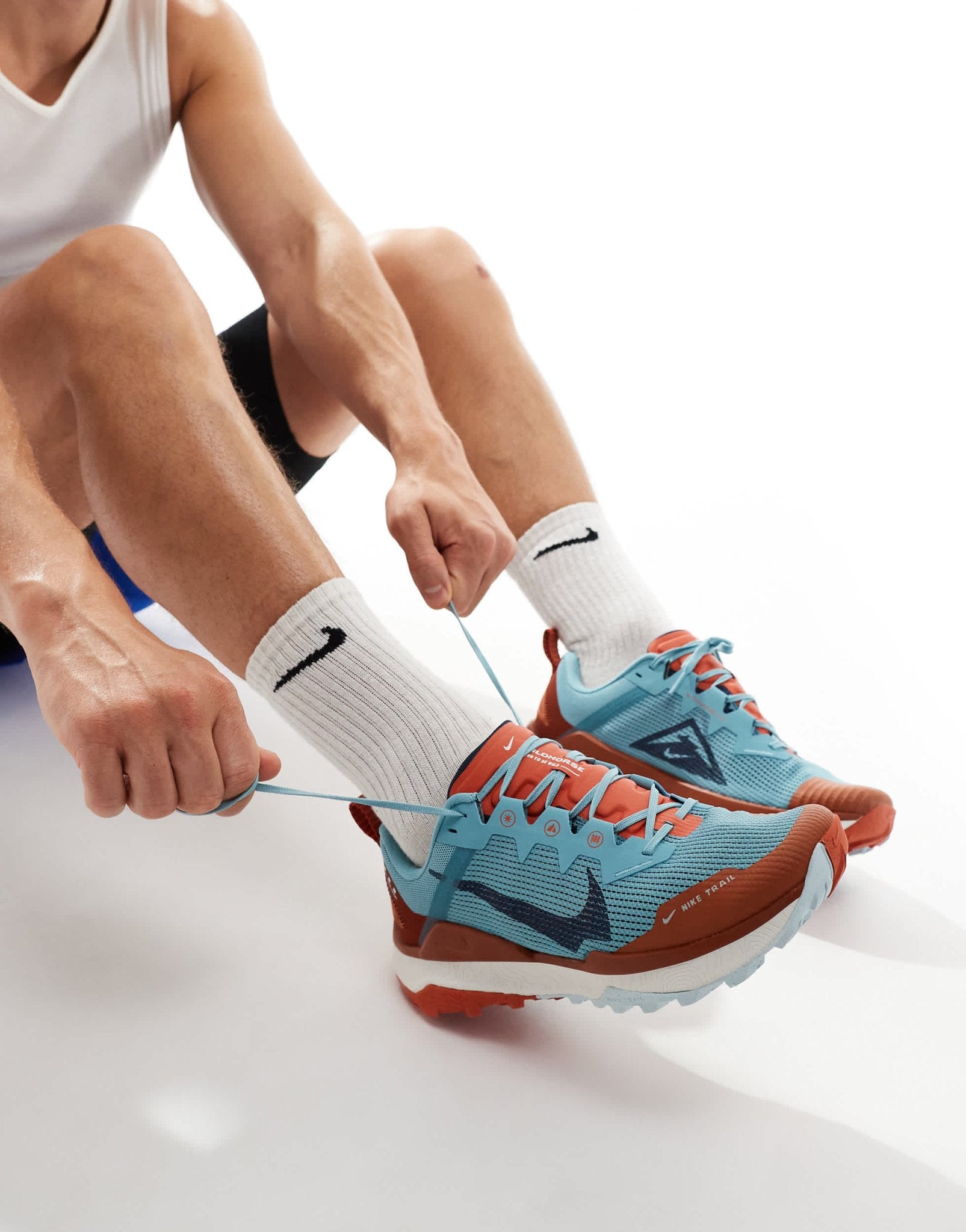 Nike Running React Wildhorse 8 trainers in light blue and orange - ASOS Sample Sale EU Store
