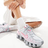 Nike Shox TL unisex trainers in metallic silver and pink