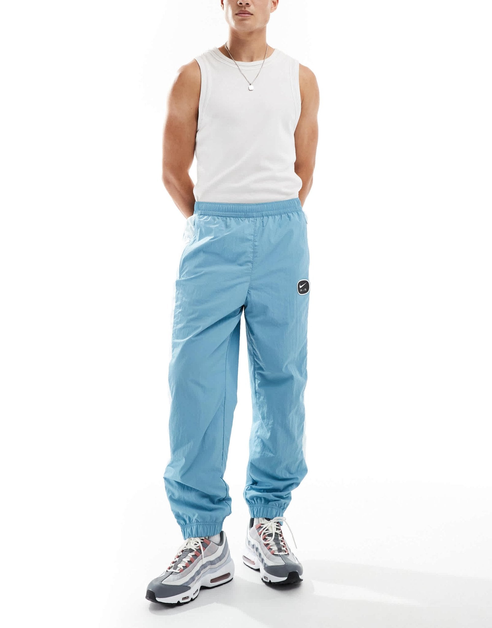 Nike Swoosh Air woven joggers in light blue - ASOS Sample Sale EU Store