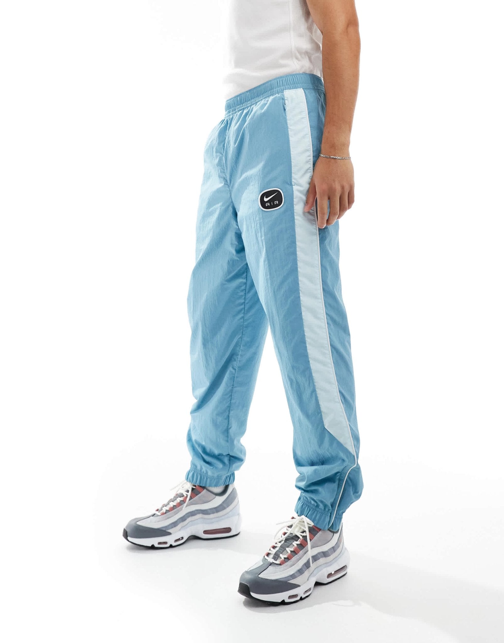 Nike Swoosh Air woven joggers in light blue - ASOS Sample Sale EU Store