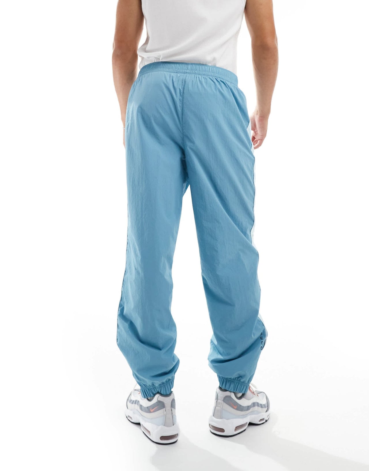 Nike Swoosh Air woven joggers in light blue - ASOS Sample Sale EU Store