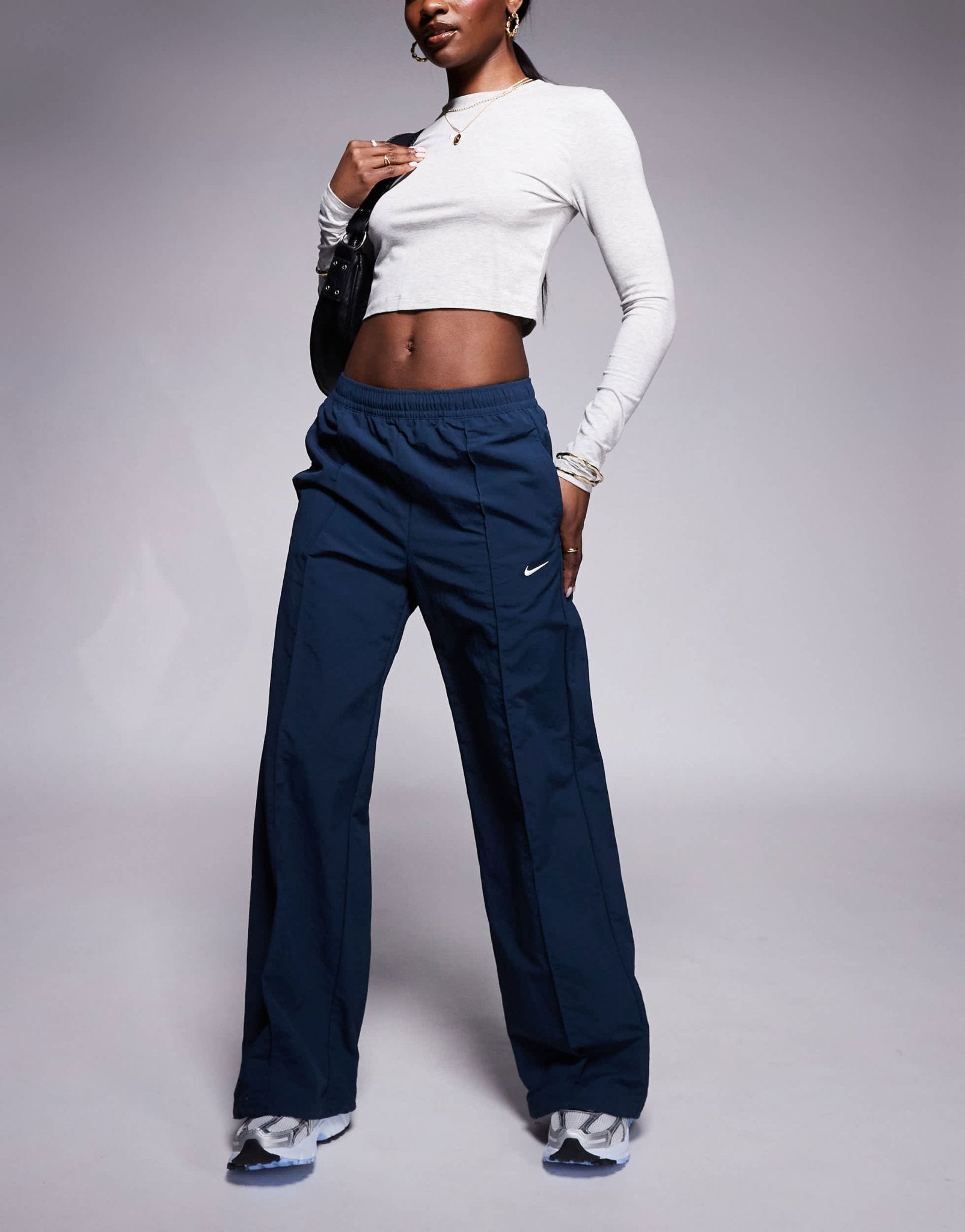 Nike Trend woven mid rise wide leg trousers in navy - ASOS Sample Sale EU Store