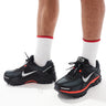 Nike Zoom Vomero 5 trainers in black and metallic silver