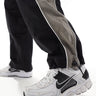 Nike Zoom Vomero 5 trainers in white and black
