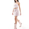 Conjunto de minifalda con brillo Pieces concert en rosa