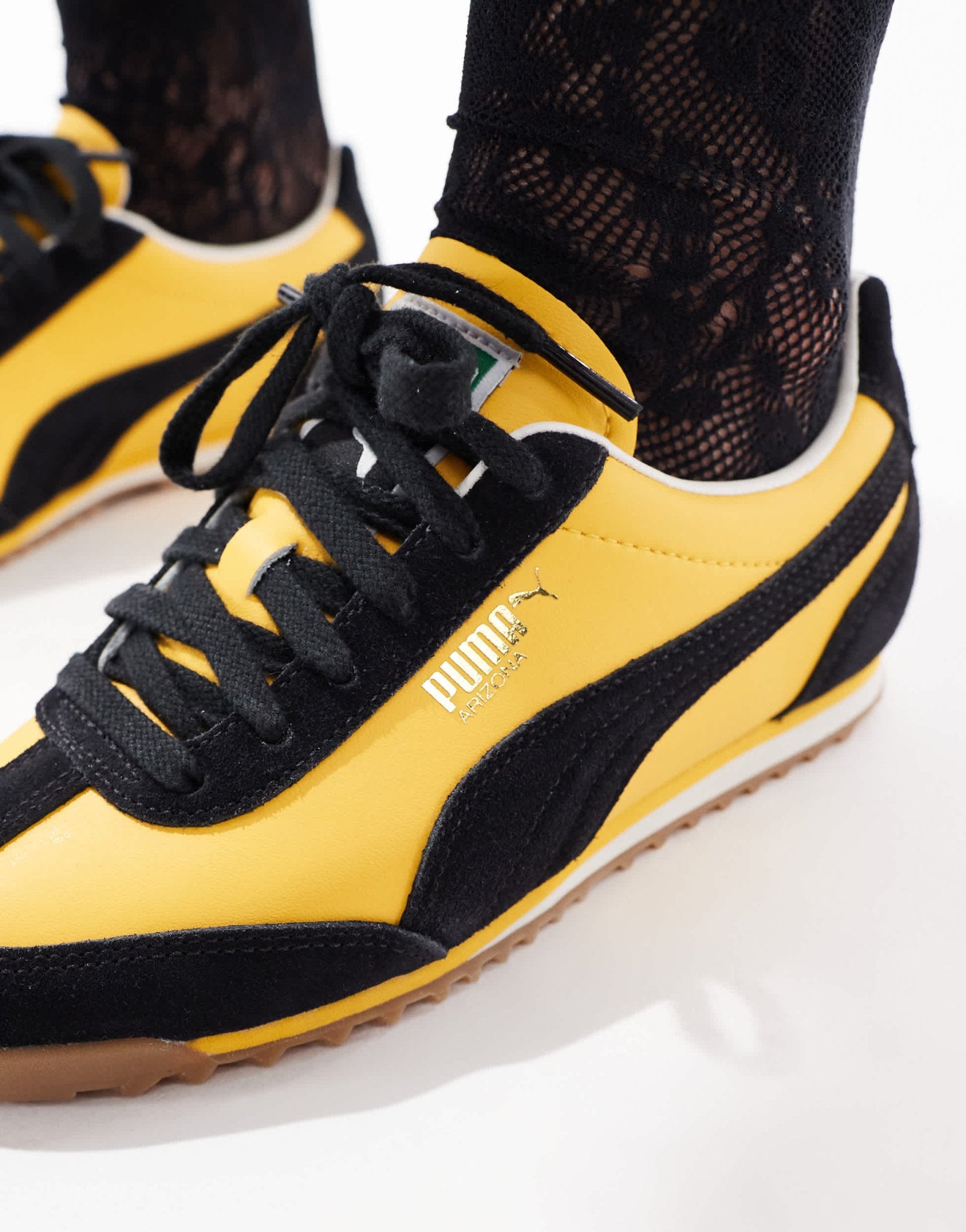 Puma Arizona trainers in yellow & black - ASOS Sample Sale EU Store