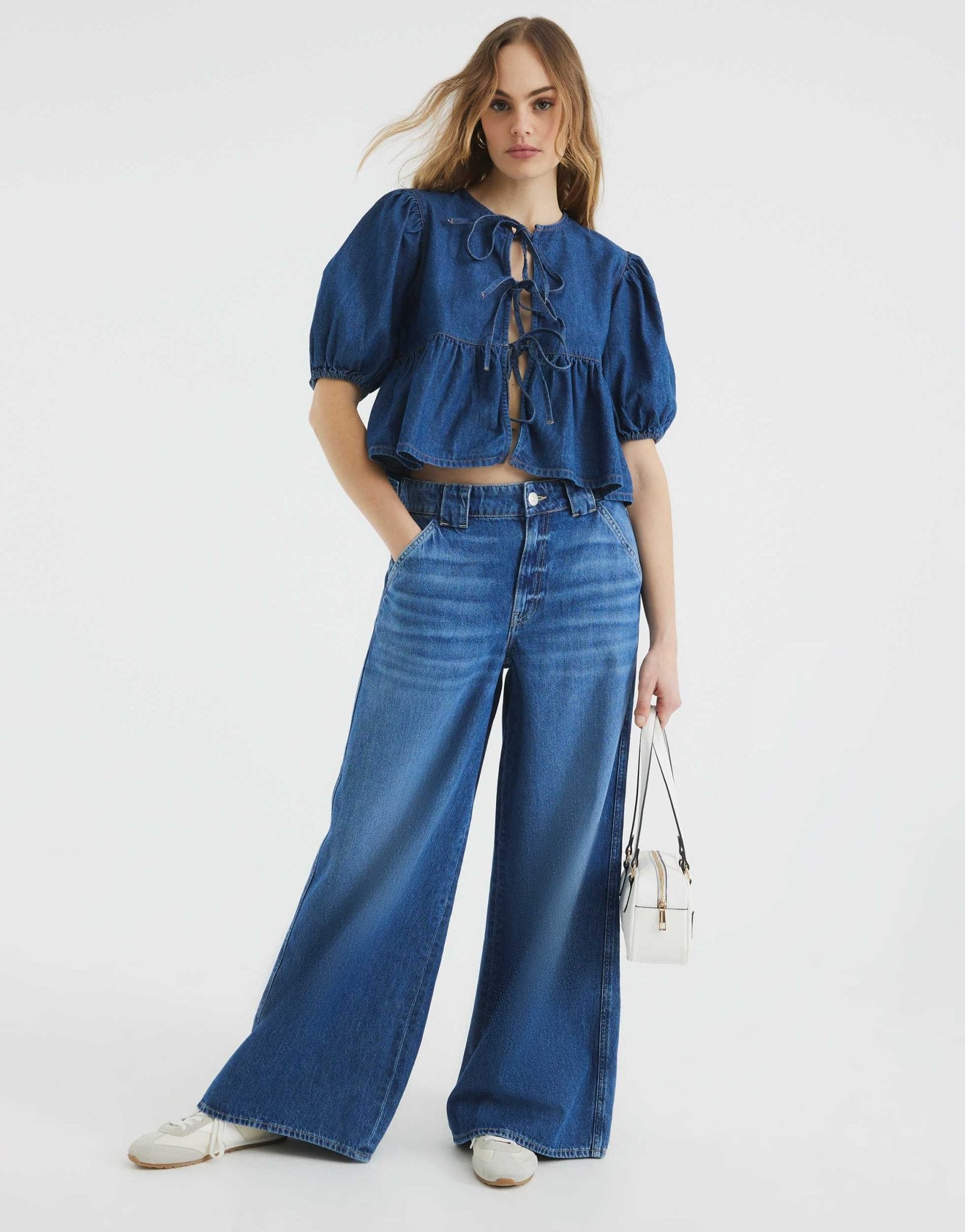 River Island denim puff sleeve top in mid blue - ASOS Sample Sale EU Store