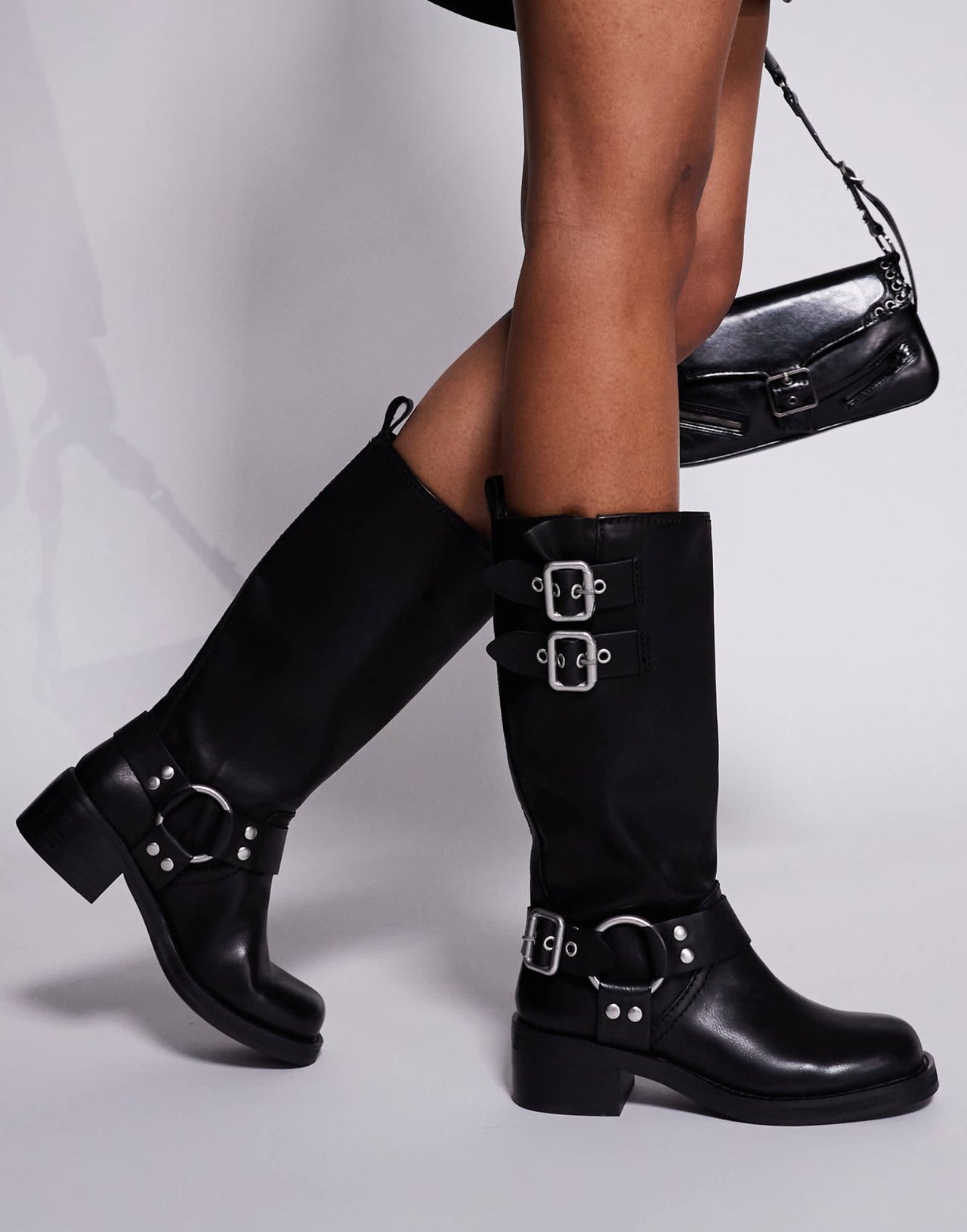 Steve Madden Eastern biker knee boots with chunky hardwear in Black - ASOS Sample Sale EU Store
