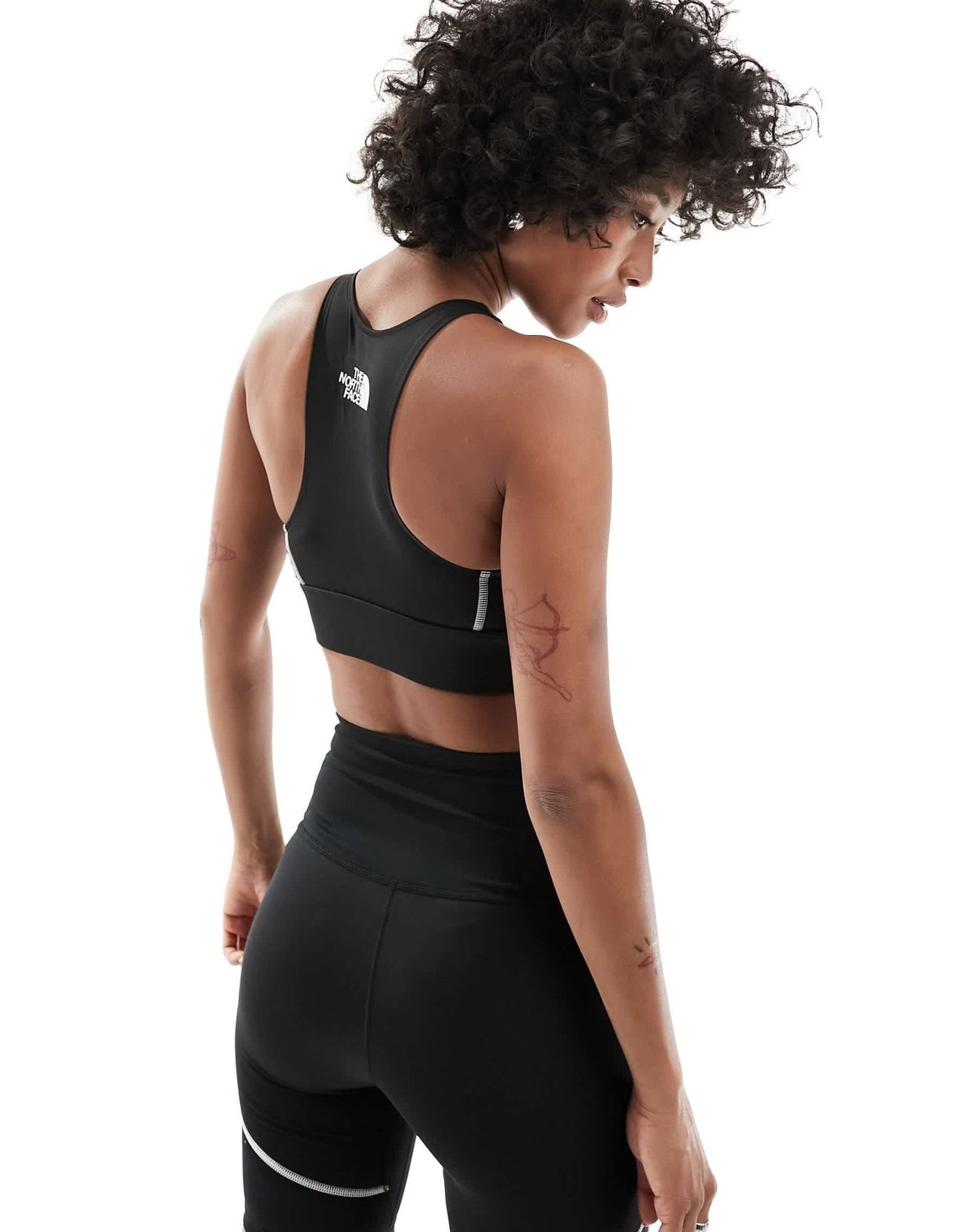 The North Face Training Hakuun contour seam mid support sports bra in black - ASOS Sample Sale EU Store