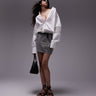 Minigonna in denim con balza stampa leopardata Topshop
