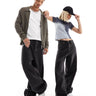 Weekday Unisex Astro loose fit wide leg jeans in tuned black